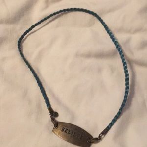Turquoise leather braid with “Believe” charm